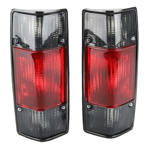     
                
                
    Luces traseras ahumadas en negro y rojo para Volkswagen Caddy Mk1 - GC15600

